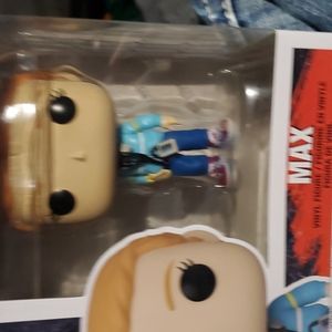 Max funko pop comes with a extra  Surprise